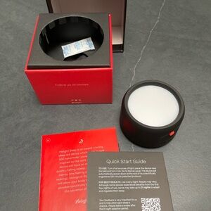 Black Sleep Aid Device with Red Accents